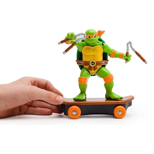 TMNT Ninja kornjače figura s borbenim pokretima i skateboardom Michelangelo